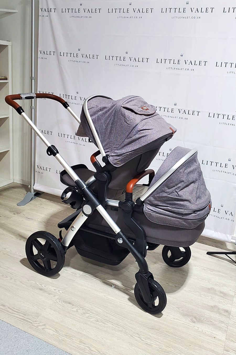 Silver Cross Wave with seat unit and carrycot fitted together, rear view