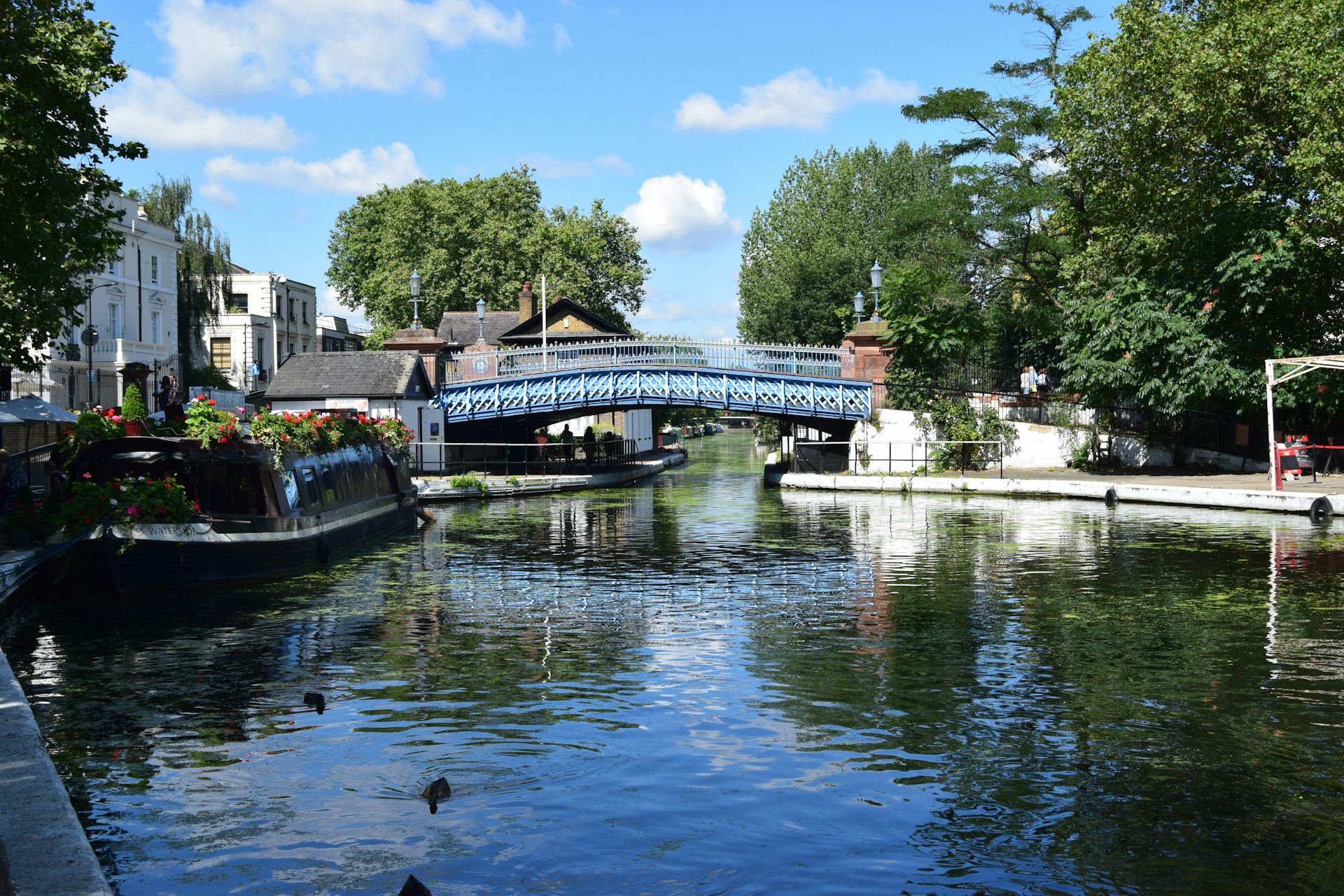 Colourful narrowboats on Regent's Canal near Little Venice London